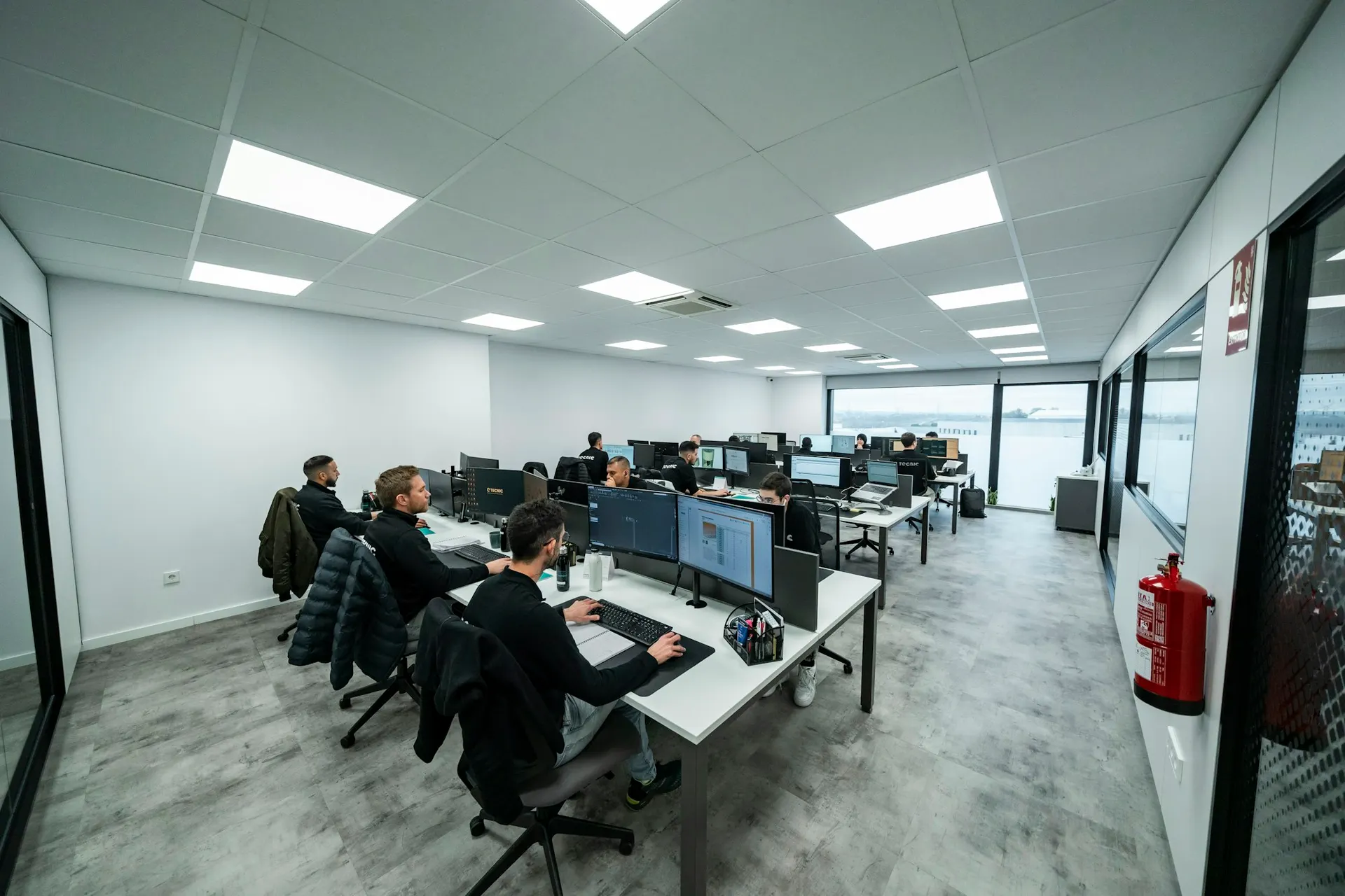 Desktop computers set up in a modern office, representing business desktop hardware categories.
