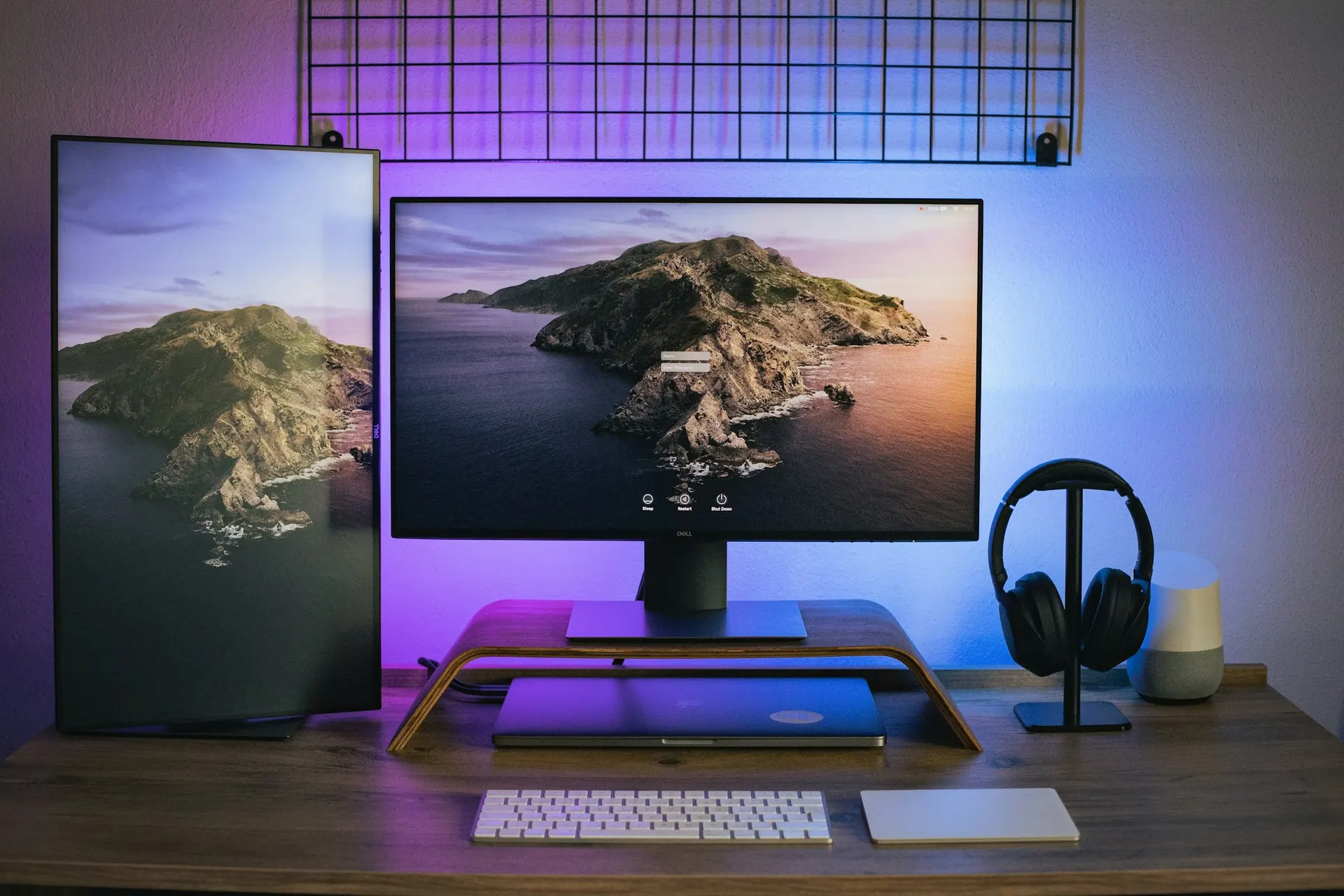 A laptop connected to a docking station and external monitor on an office desk.