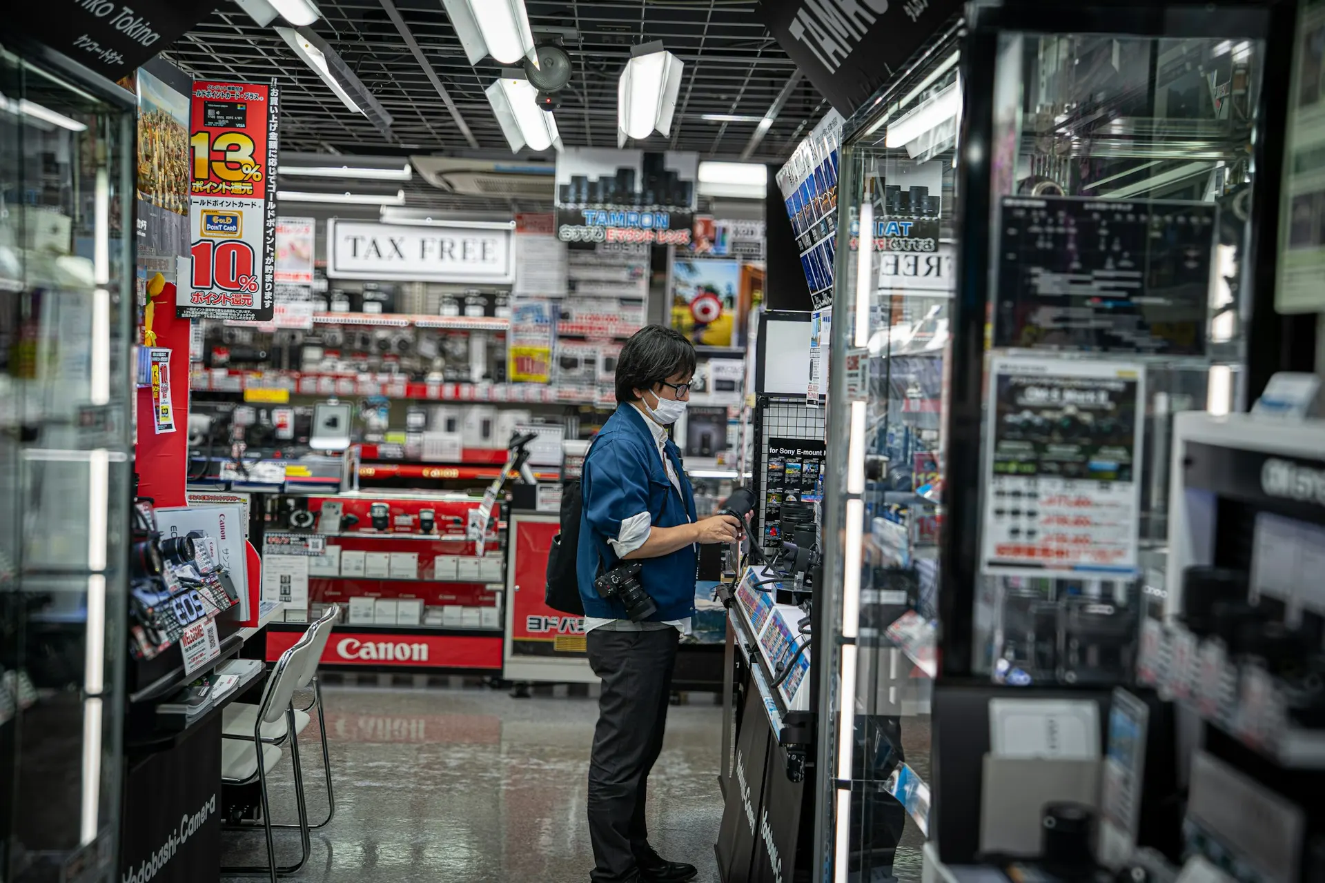 Technology products arranged on retail shelving, representing reseller supply categories.